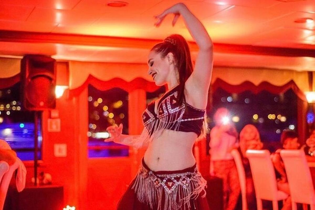 a woman dancing on a dance floor in a club