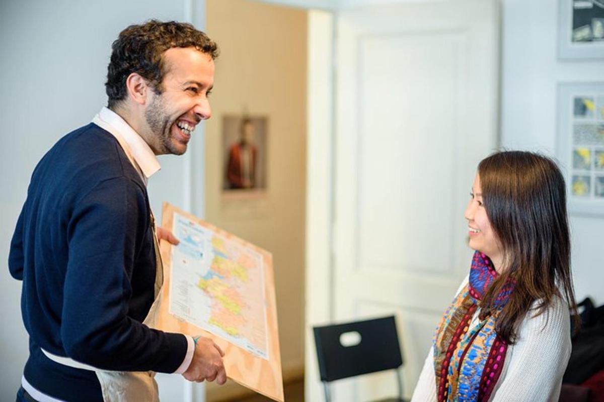 a man and a woman holding a map