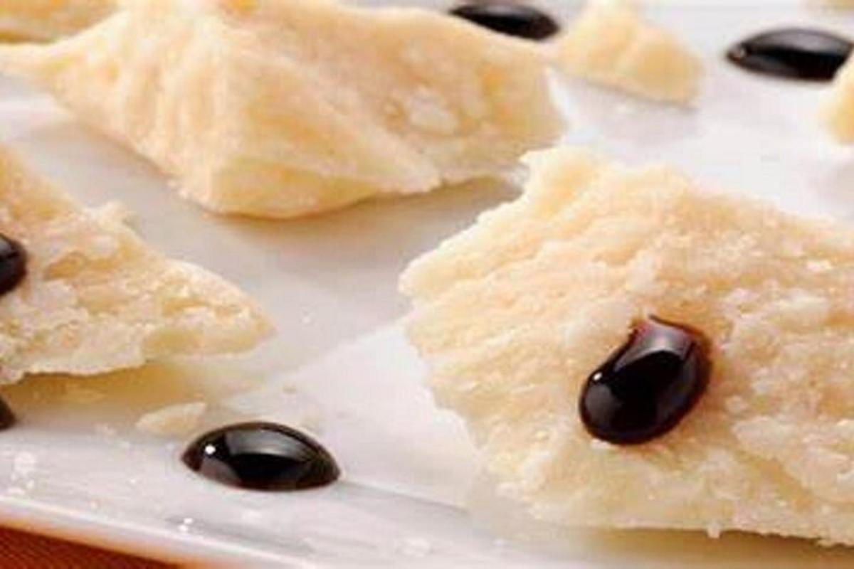 a plate of food with black olives on it