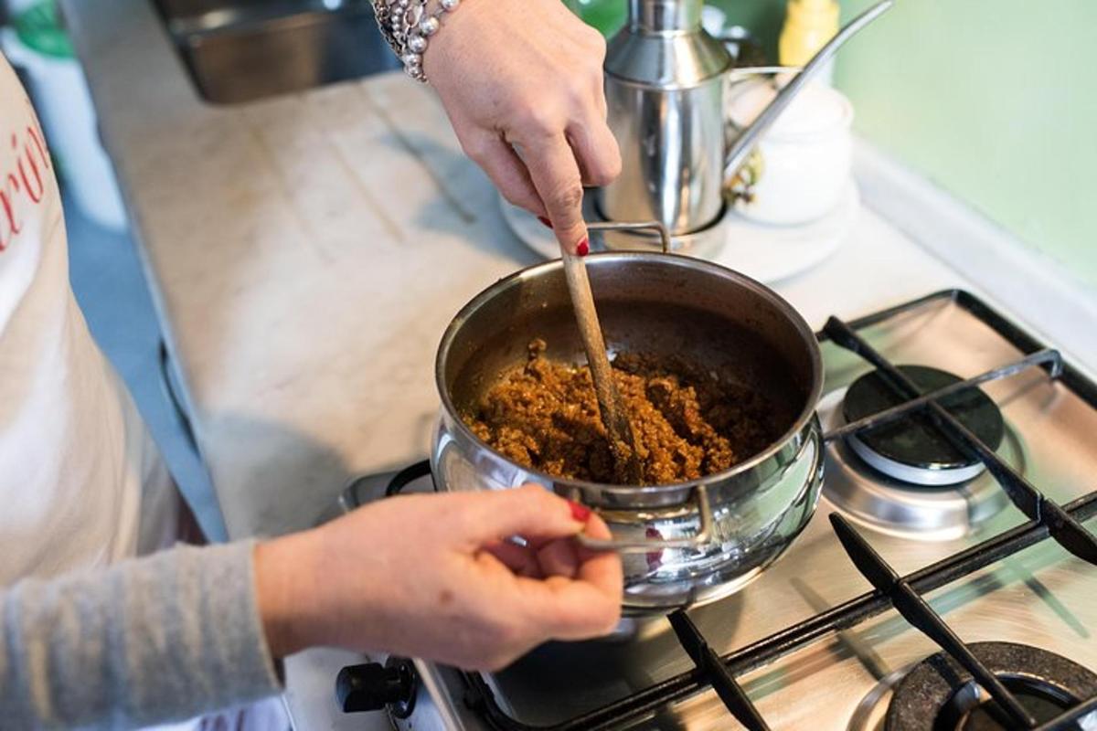 a person cooking food in a pot on a stove