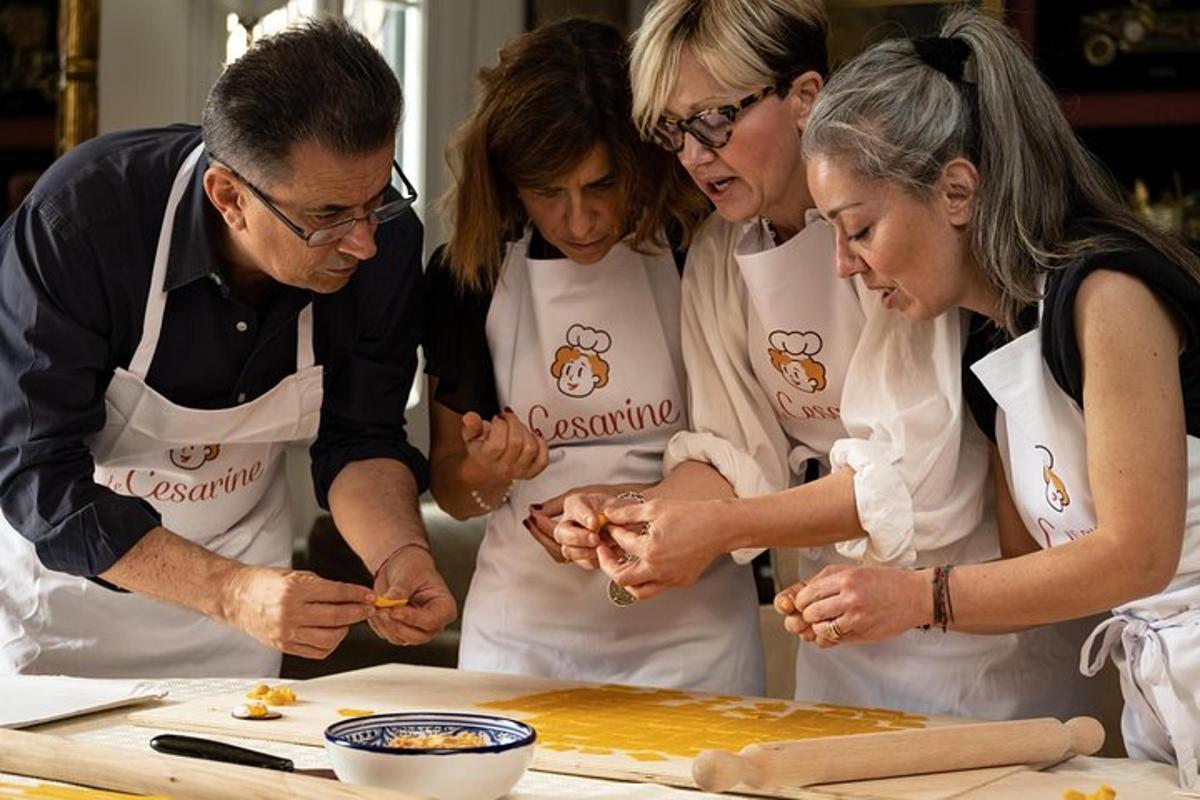 a group of people in a kitchen preparing food