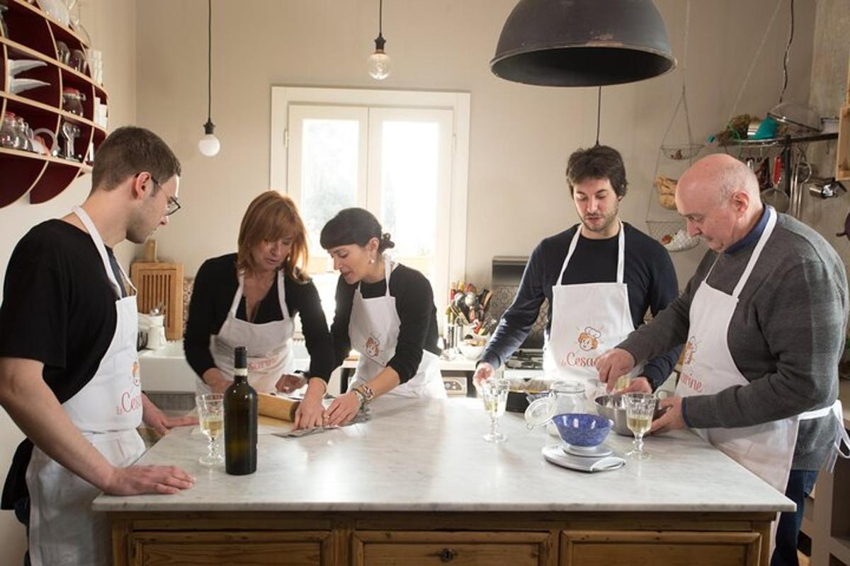 a group of people in a kitchen preparing food