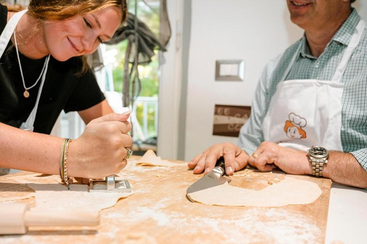 a woman cutting a piece of paper with a knife
