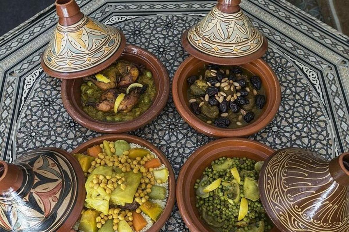 four bowls of different types of food on a table