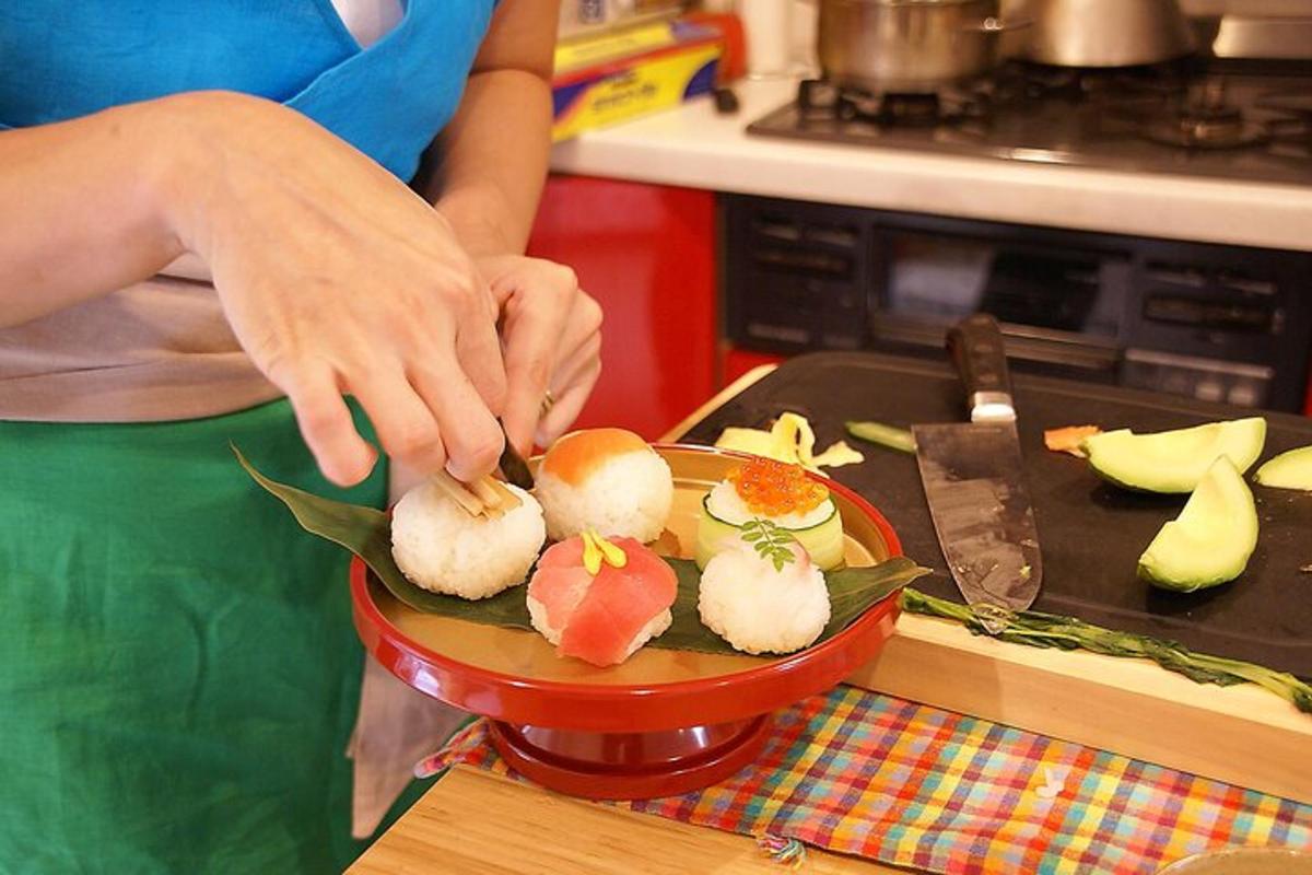 a person is cutting up vegetables on a plate