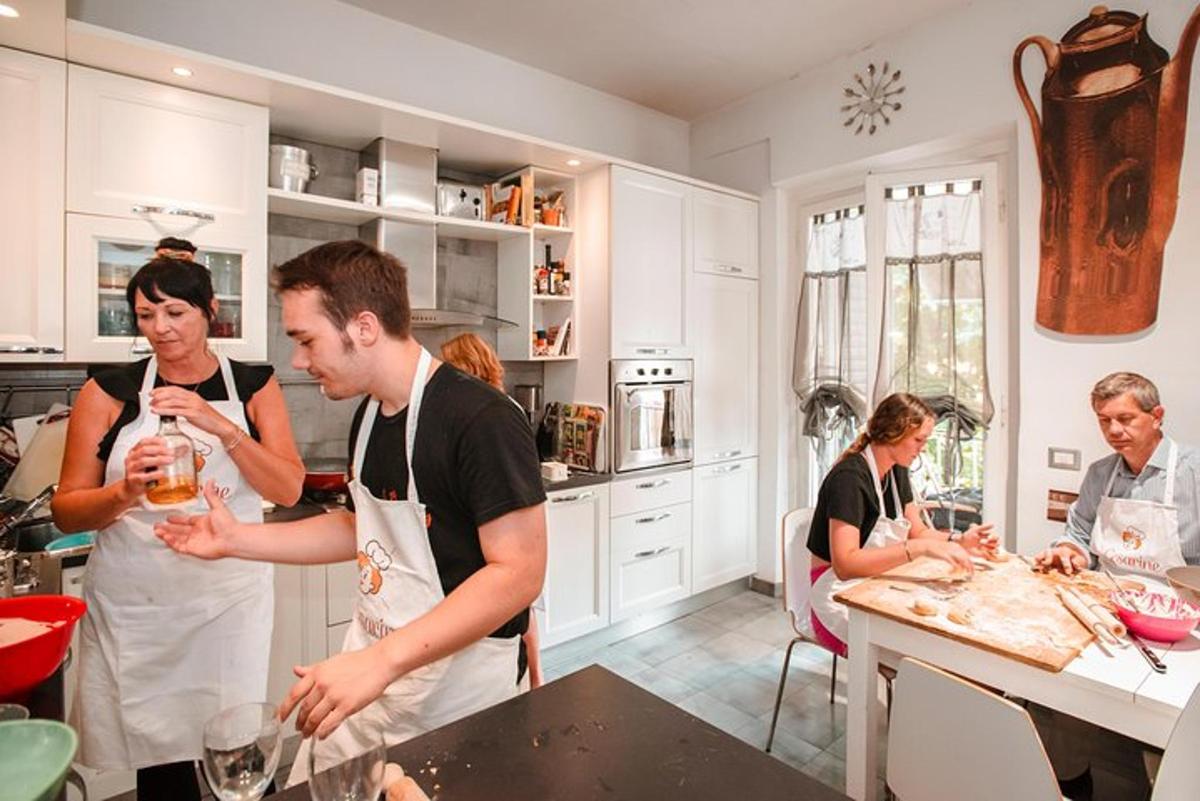 a group of people in a kitchen preparing food