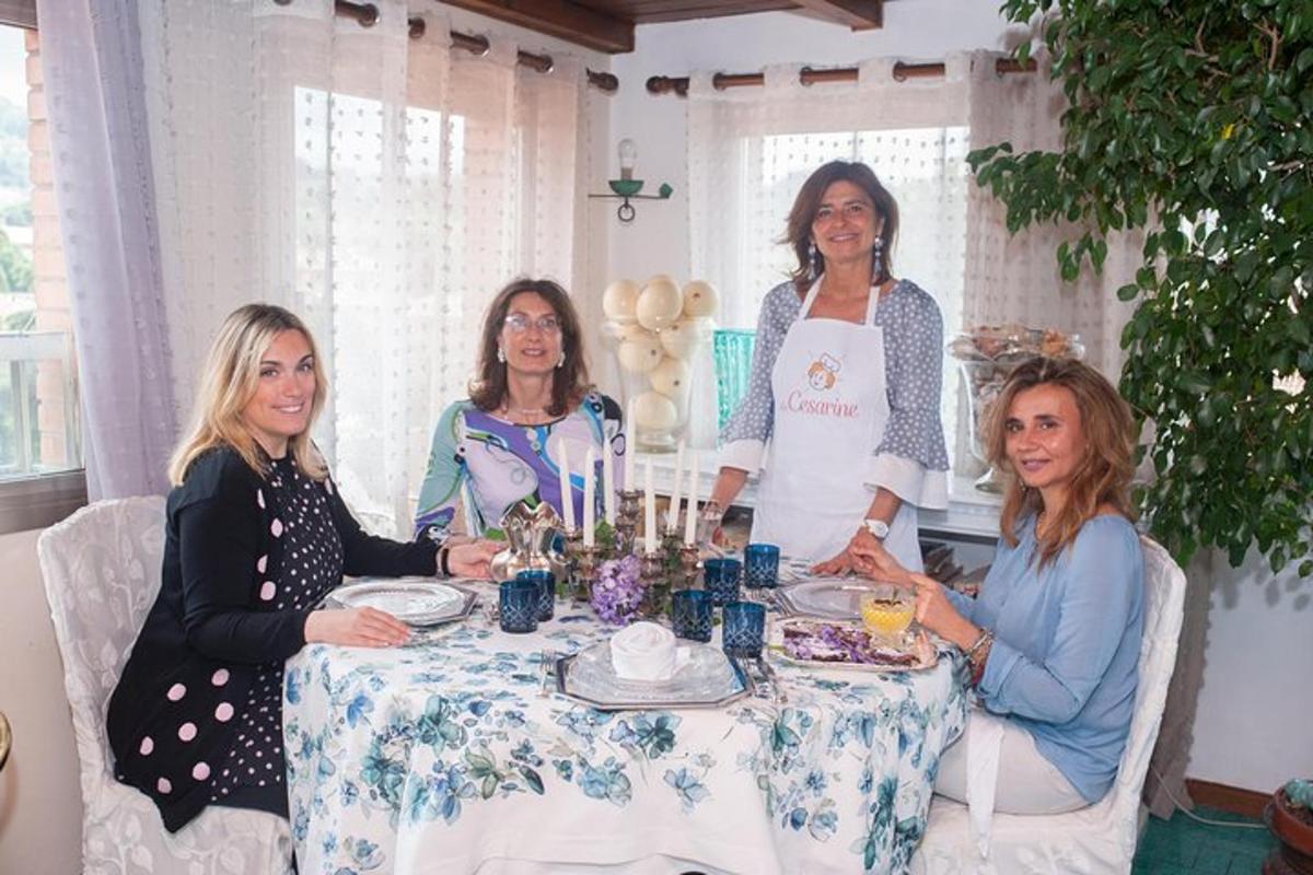 a group of women sitting around a table