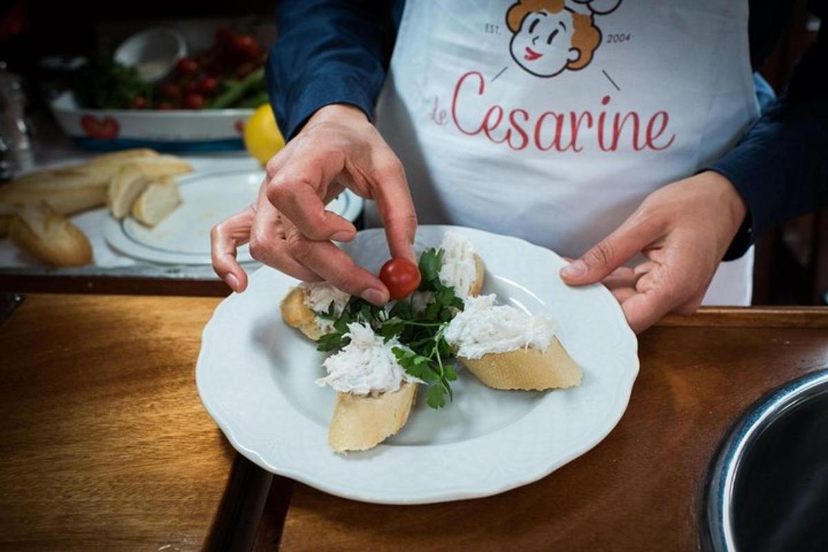 a person holding a plate of food on a table