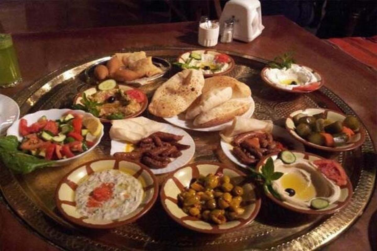 a tray filled with different types of food on a table