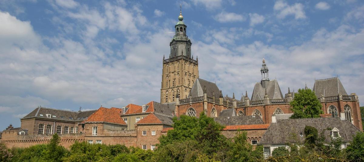a large brick building with a clock tower