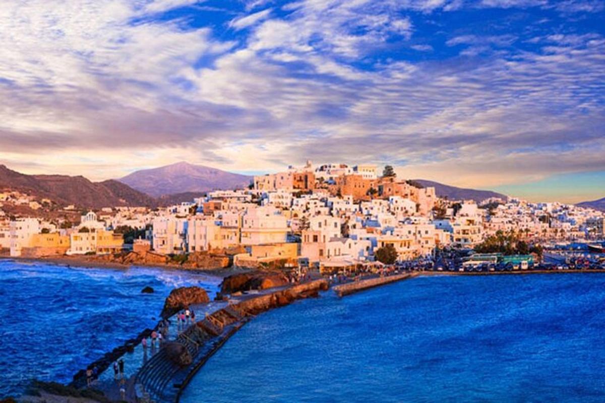a group of white buildings on a beach