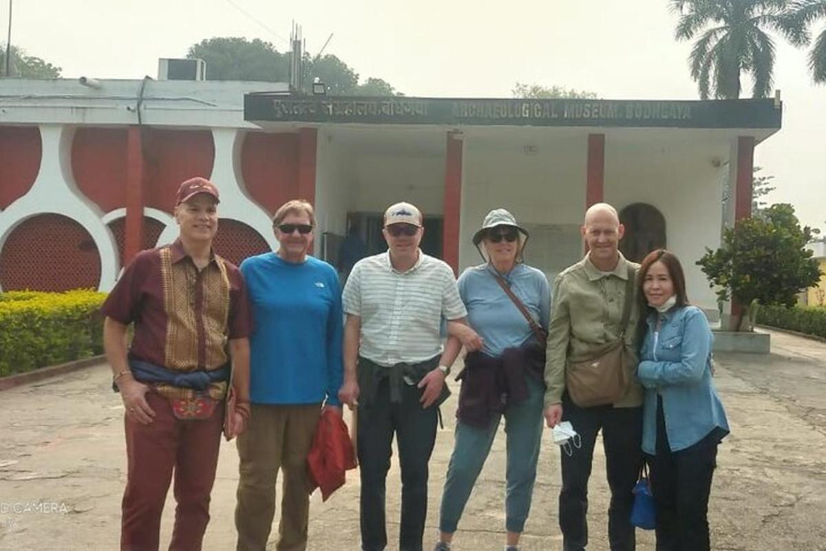 a group of people standing in front of a building