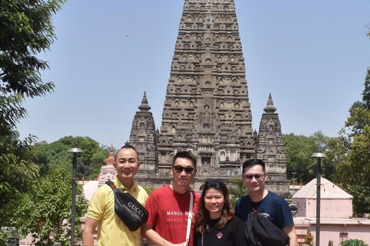a group of people standing in front of a temple