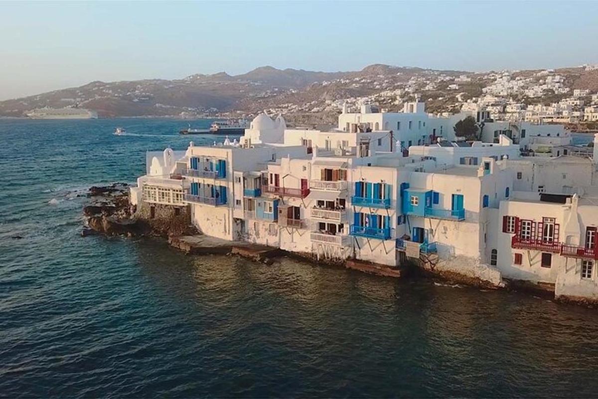 an aerial view of a group of buildings in the water