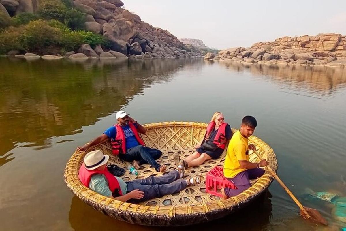 a group of people sitting in a boat on the water