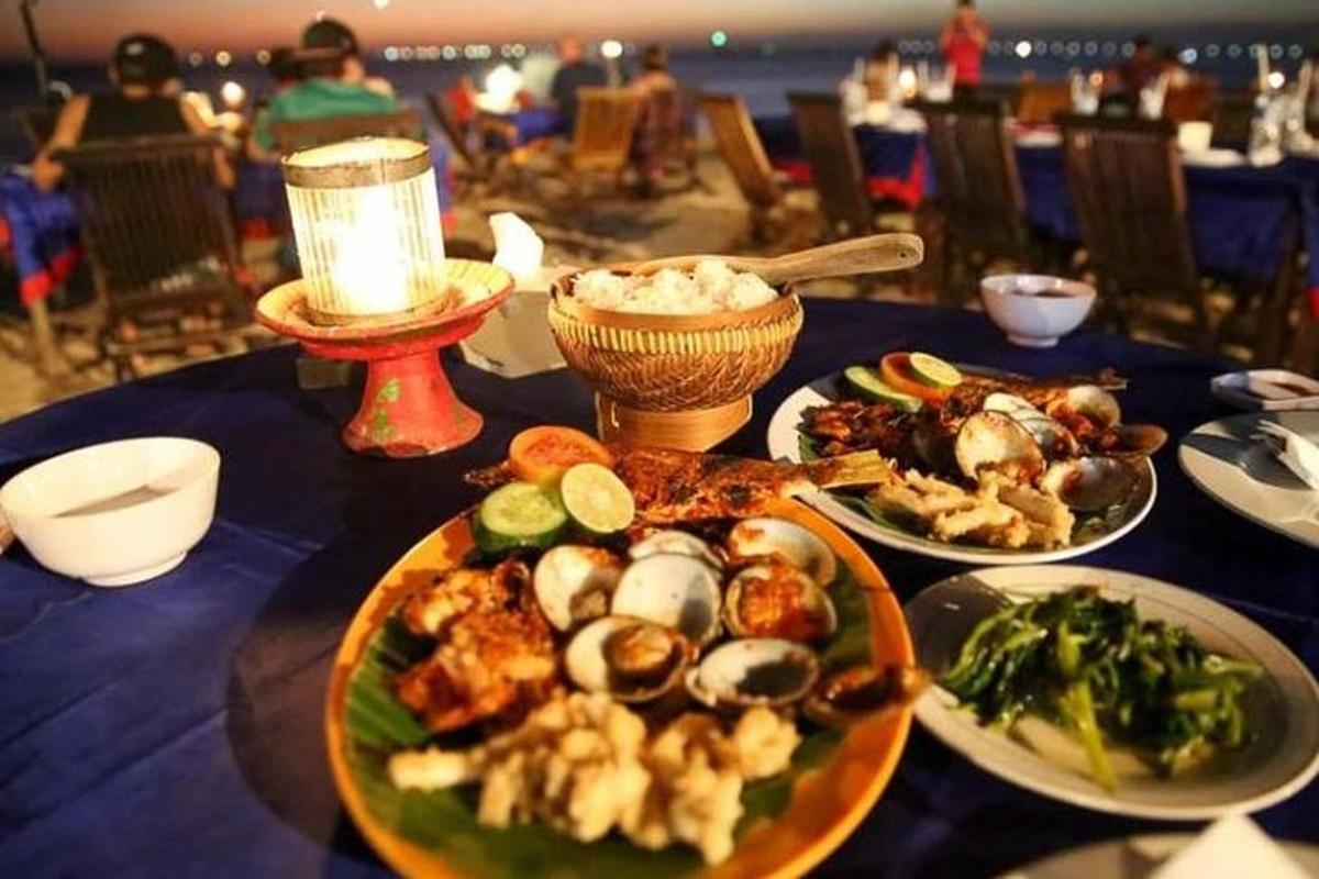 a table with plates of food on top of it