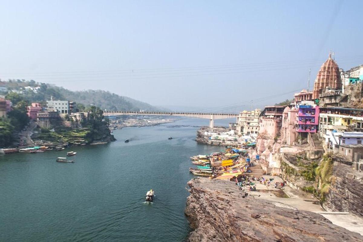 a view of a river with buildings and a bridge