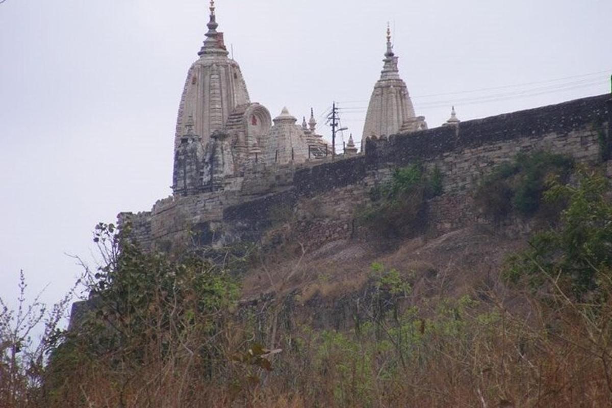 a hill with some buildings on top of it