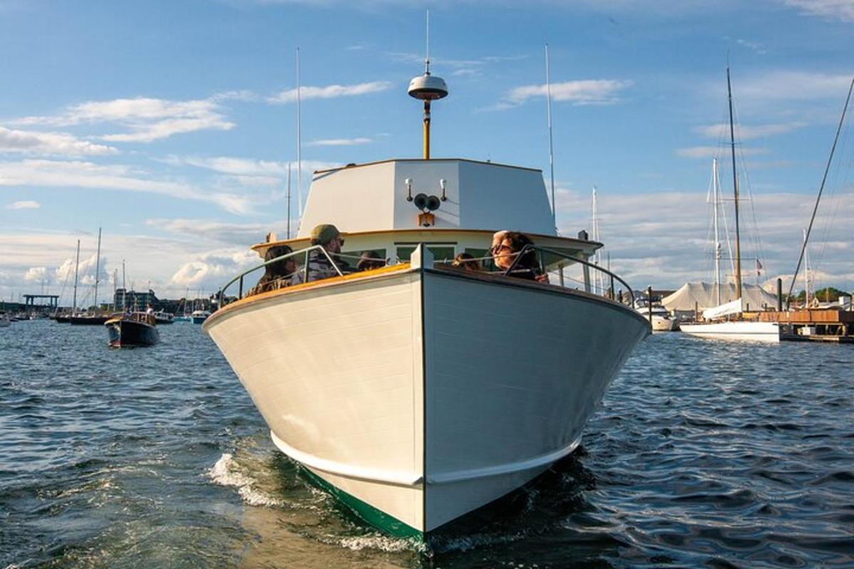 a woman is sitting on a boat in the water