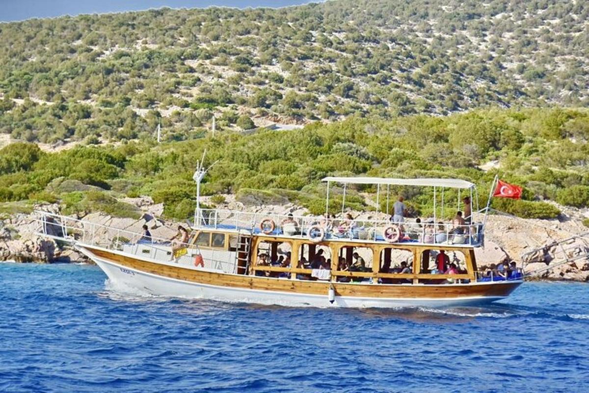 a group of people on a boat in the water