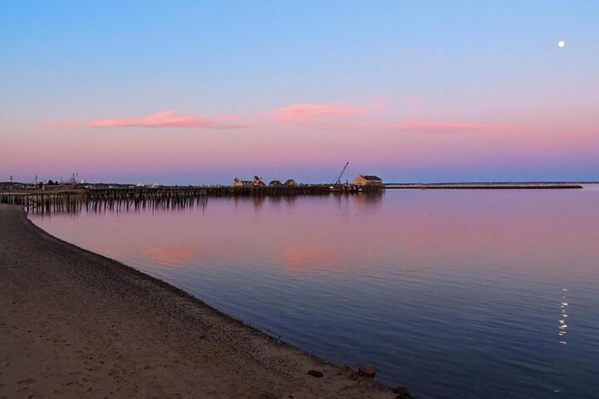 a view of a body of water at sunset