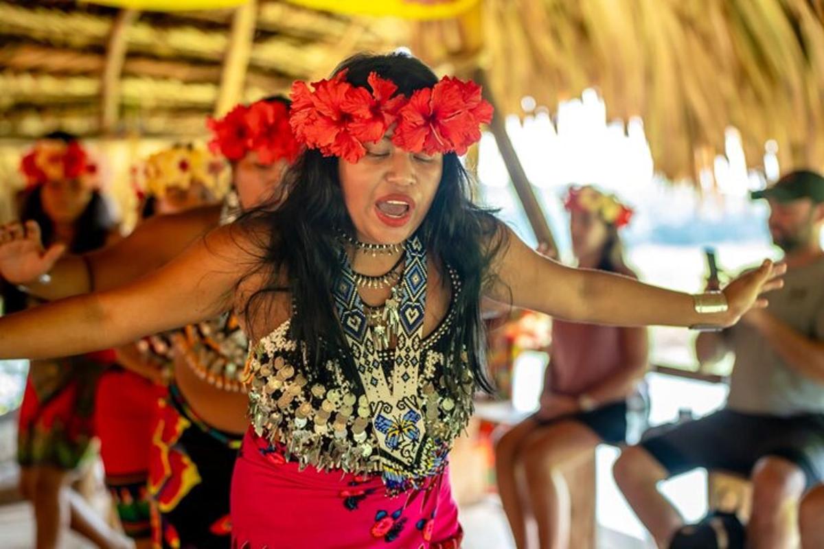 a woman wearing red flowers on her head with her arms out