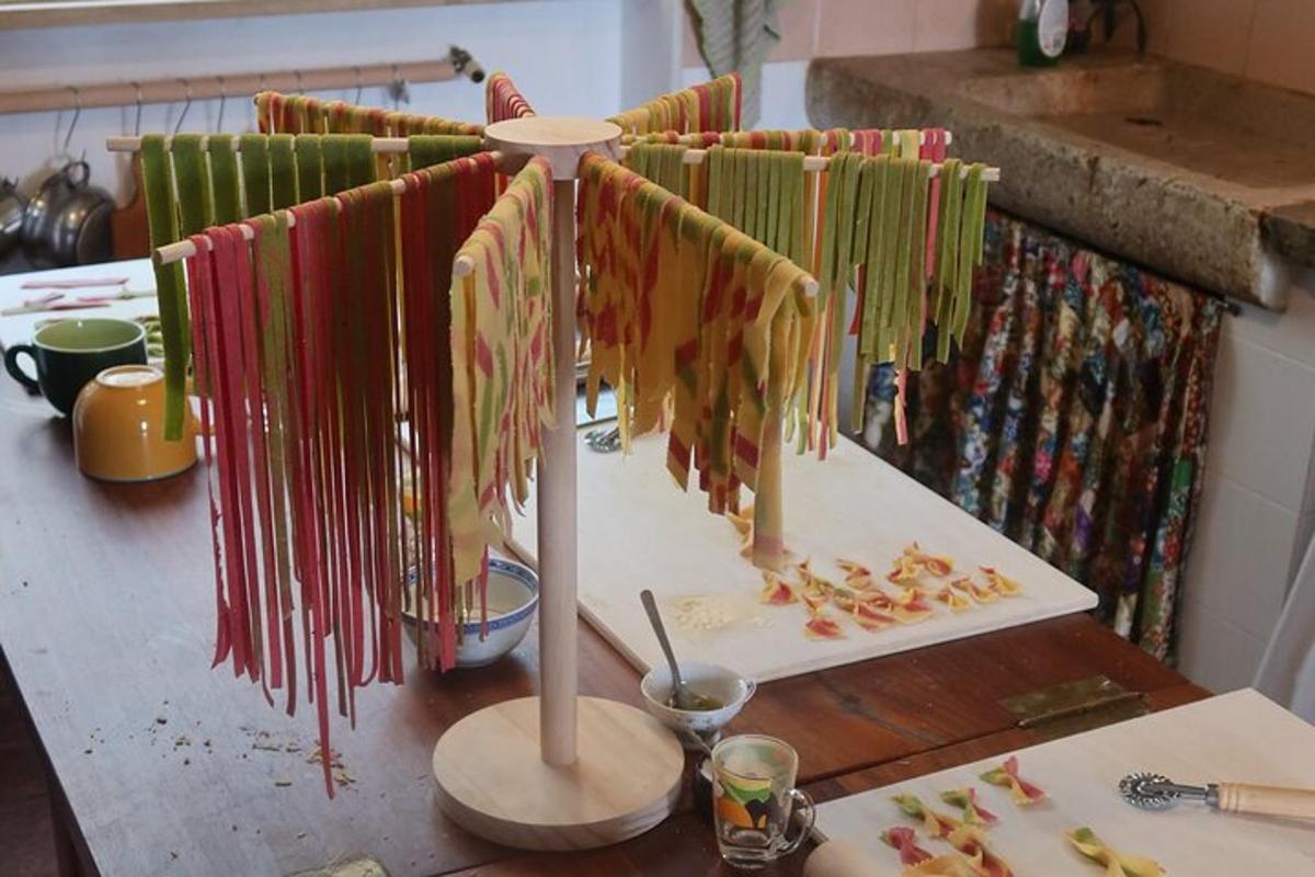a kitchen counter with a bunch of drying towels