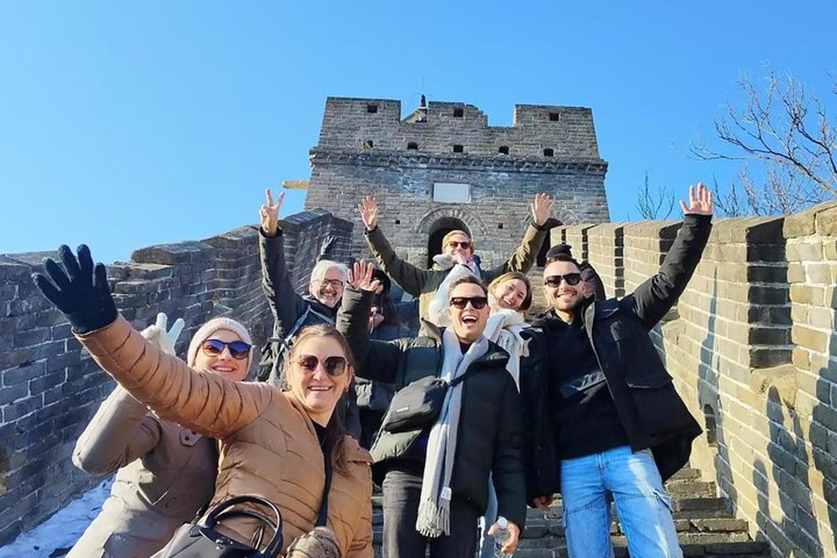 a group of people standing on the great wall