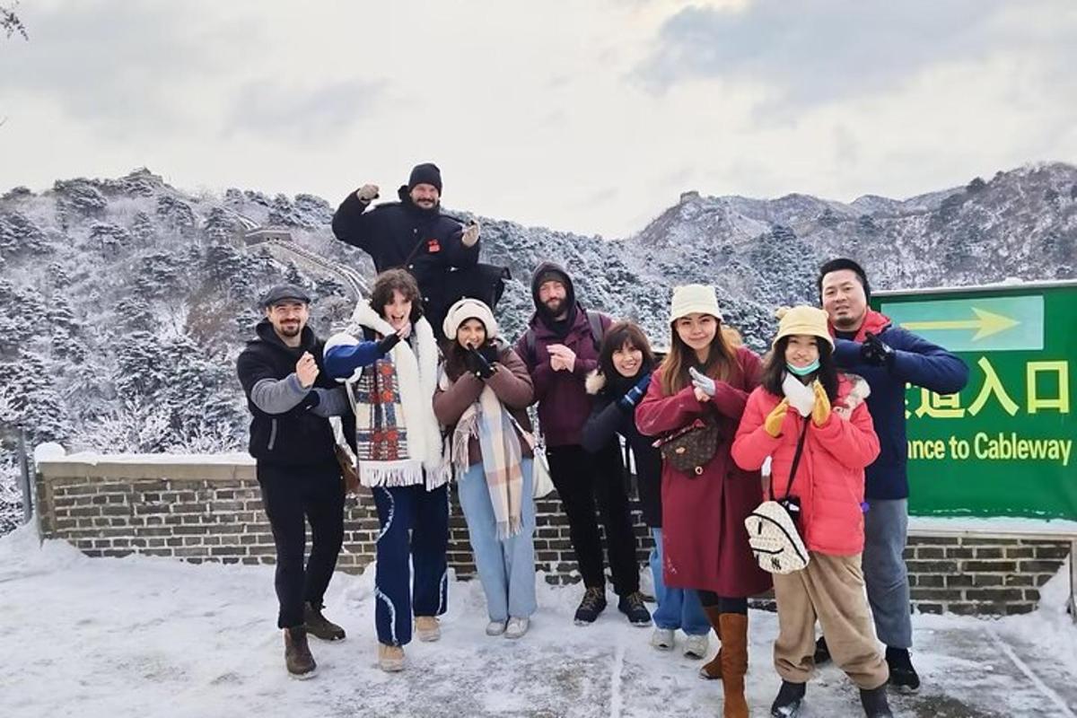 a group of people posing for a picture in the snow