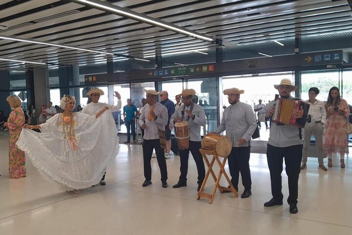 a group of people standing in an airport