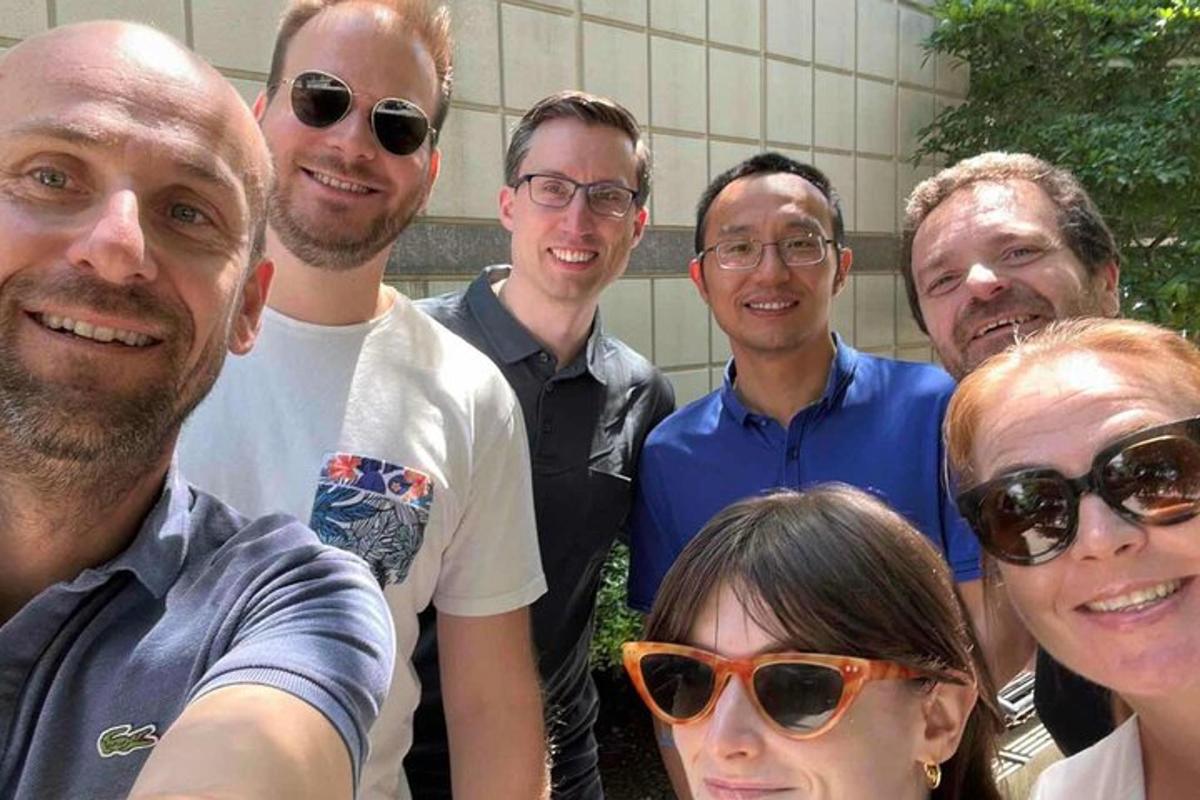 a group of people posing for a picture
