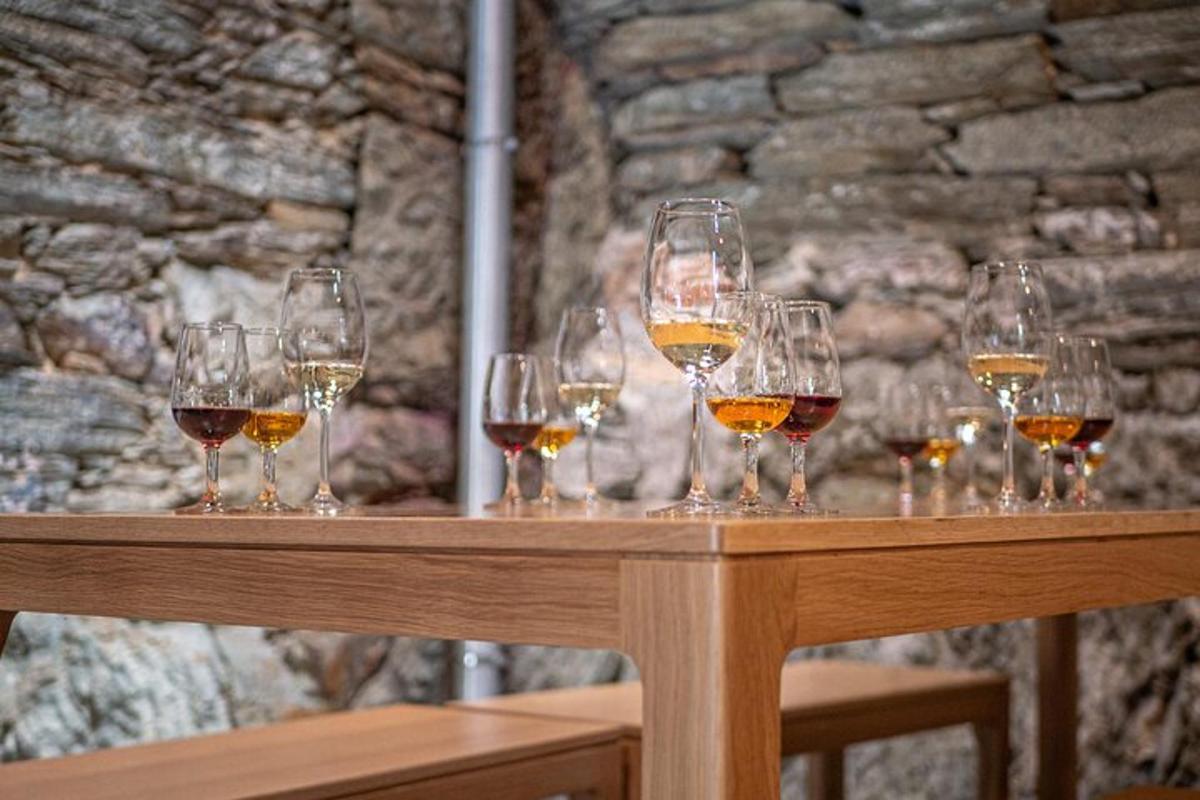 a group of wine glasses sitting on a table