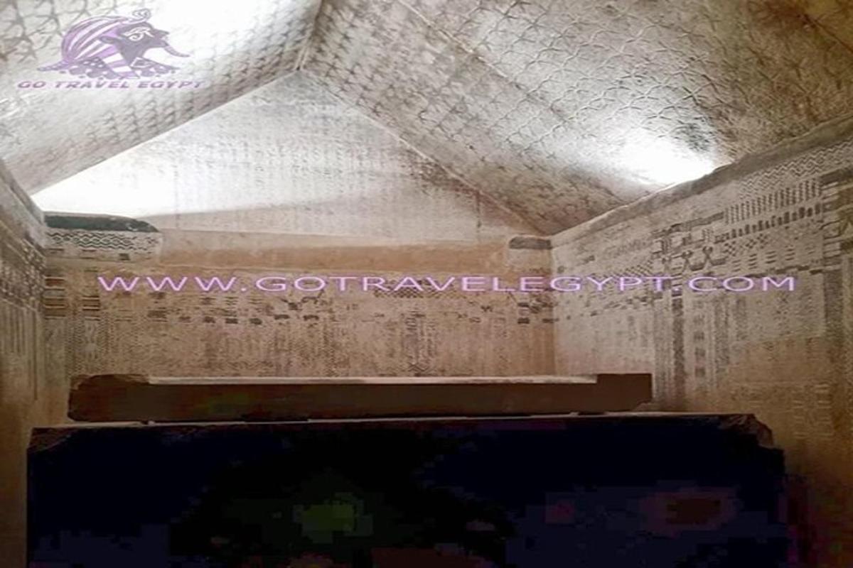 a room with a ceiling with a writing on the wall