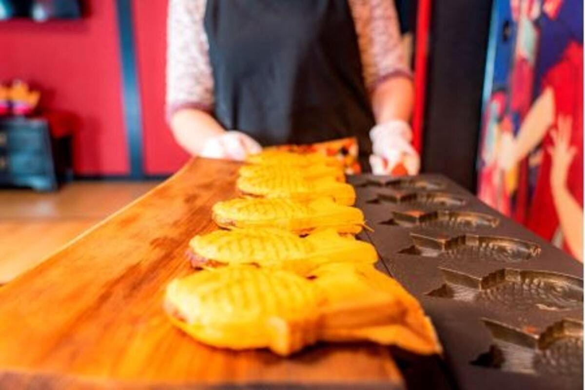 a person is preparing food on a cutting board