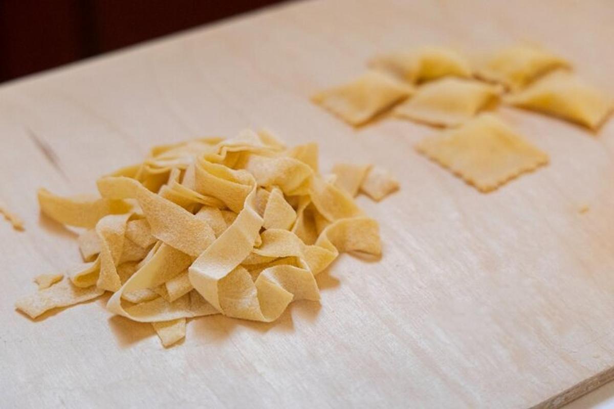a pile of uncooked pasta on a cutting board