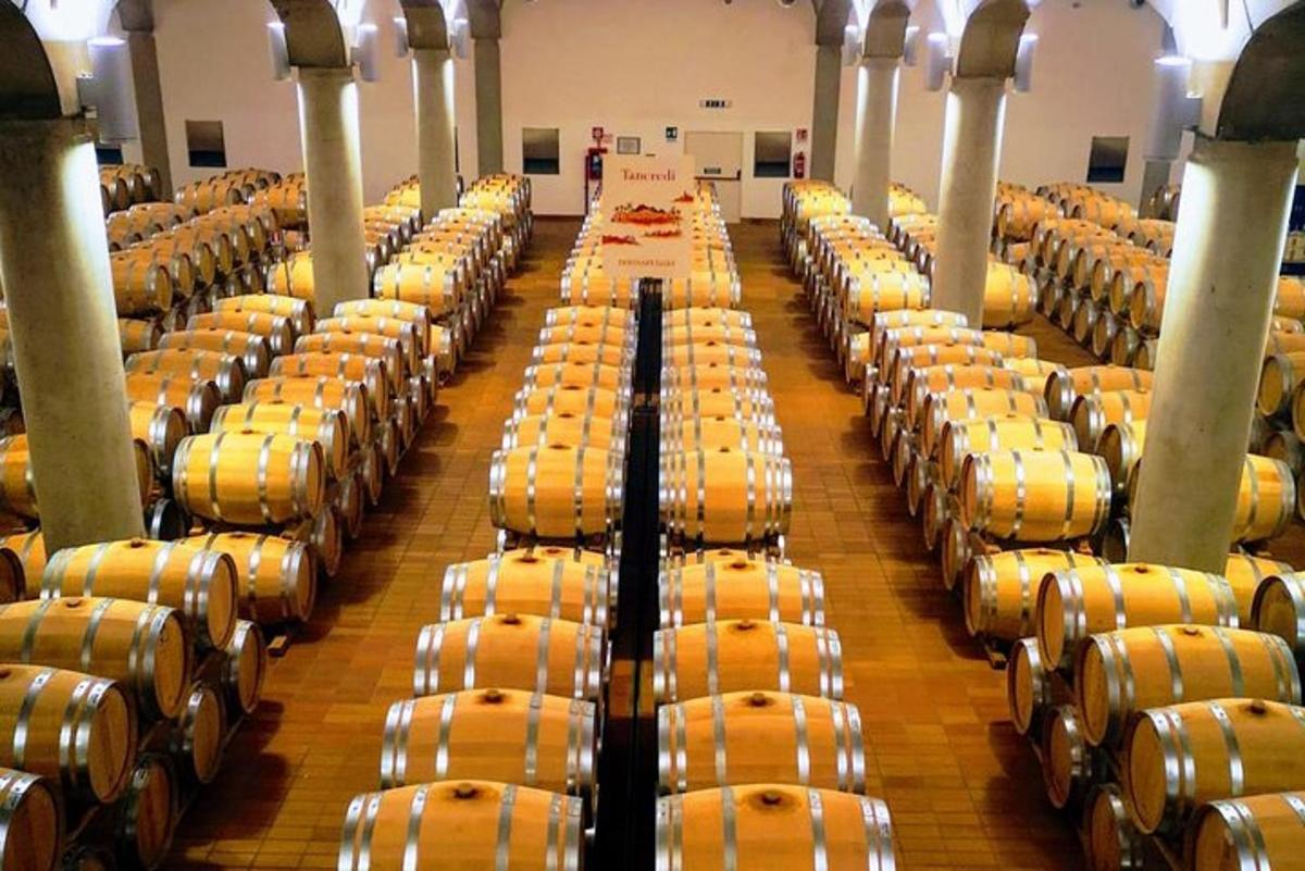 a large room filled with rows of yellow barrels