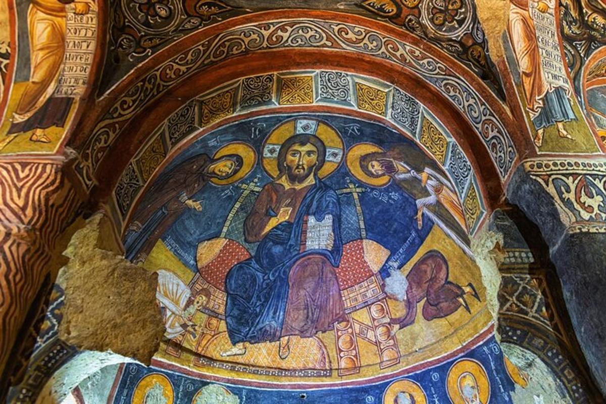 a mosaic of a religious painting on a wall