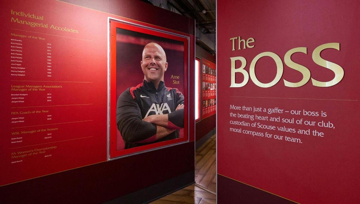 a sign for the boss with a picture of a man