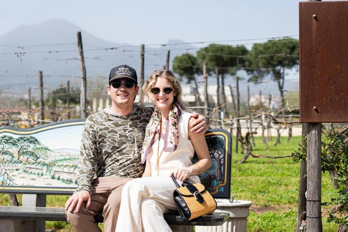 a man and a woman sitting on a bench