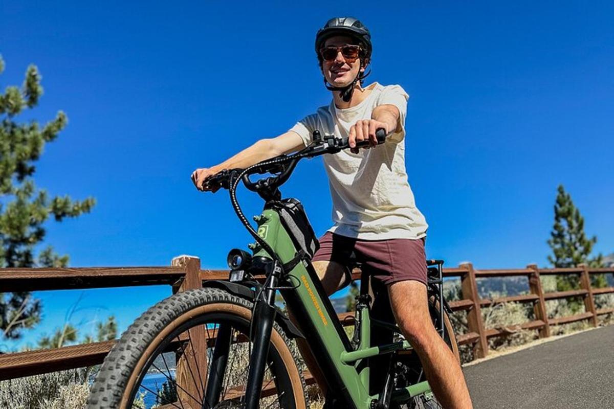 a man riding a bike on a bridge