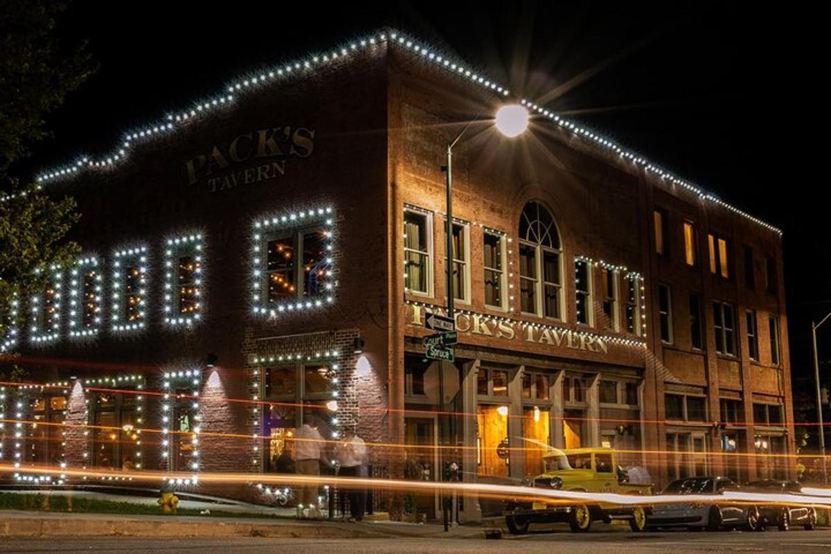 a building with christmas lights on the side of it