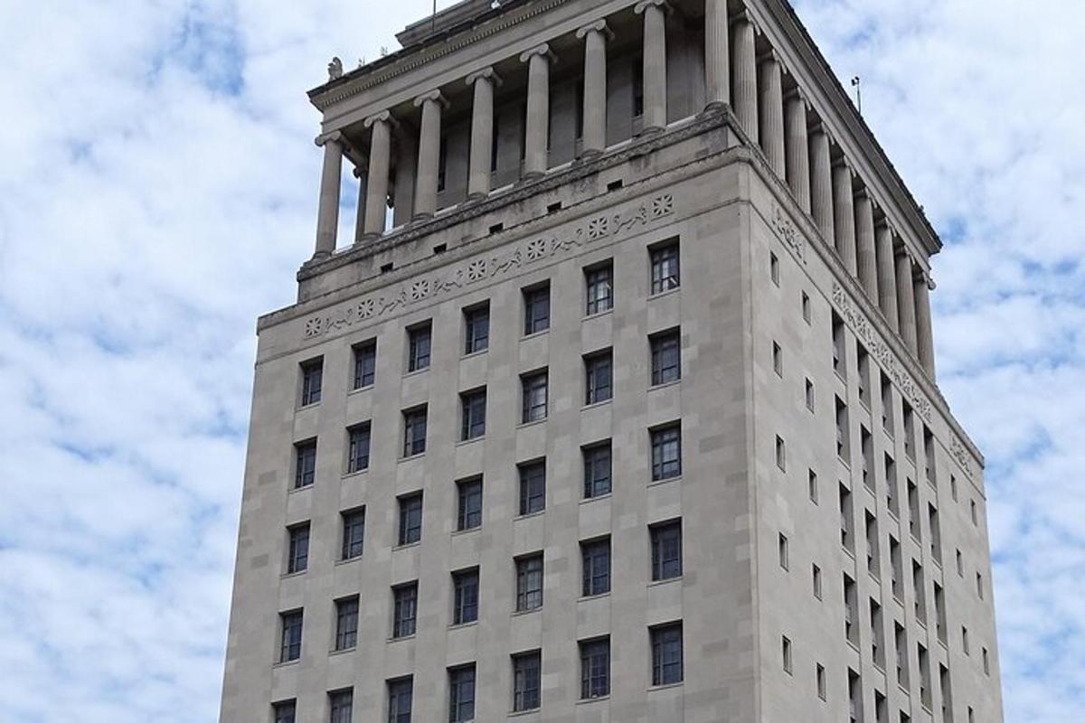 a tall building with columns on top of it