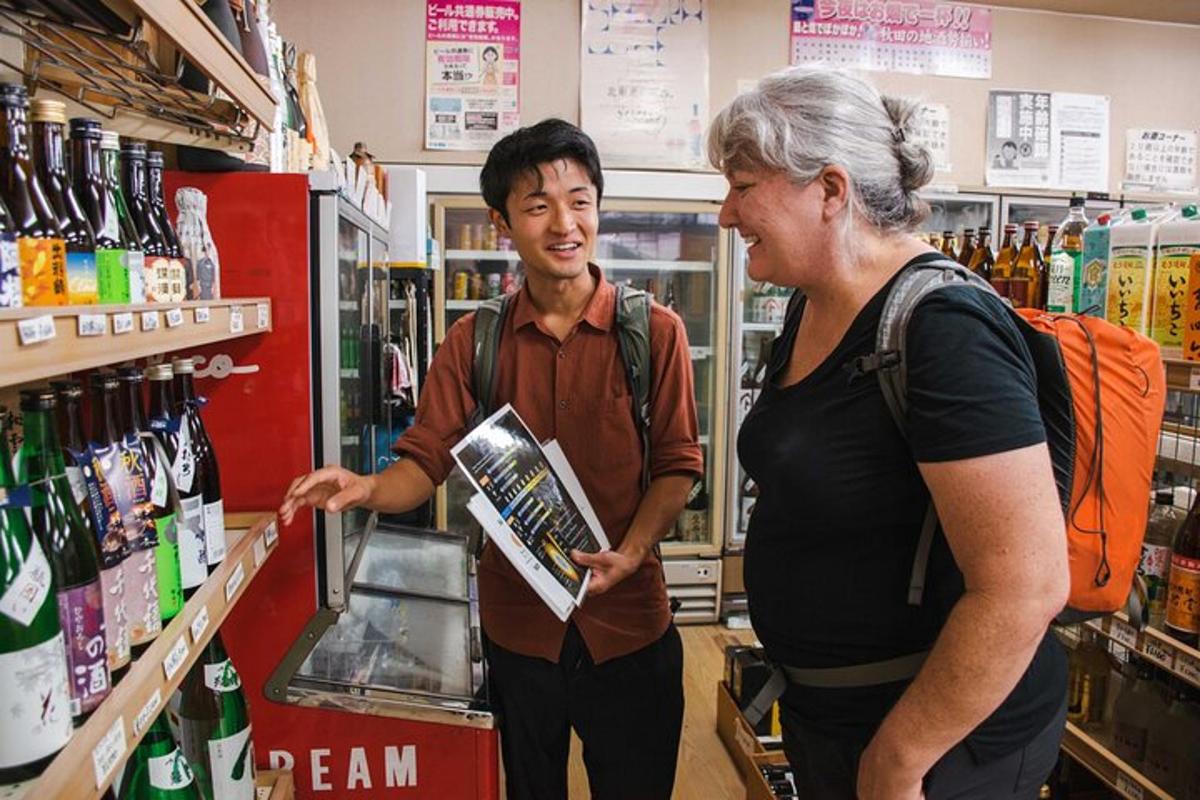a woman standing in a store talking to a man