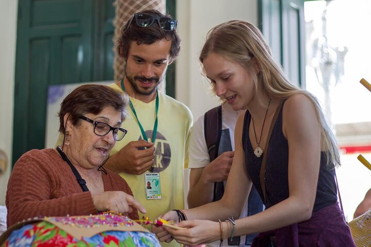 a woman is cutting a cake with scissors