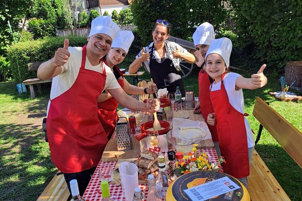 a group of people dressed in chefs standing around a table