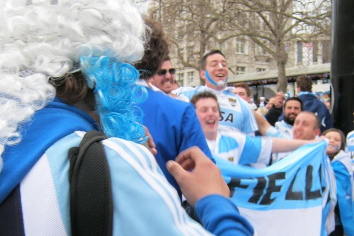 a group of people wearing blue and white