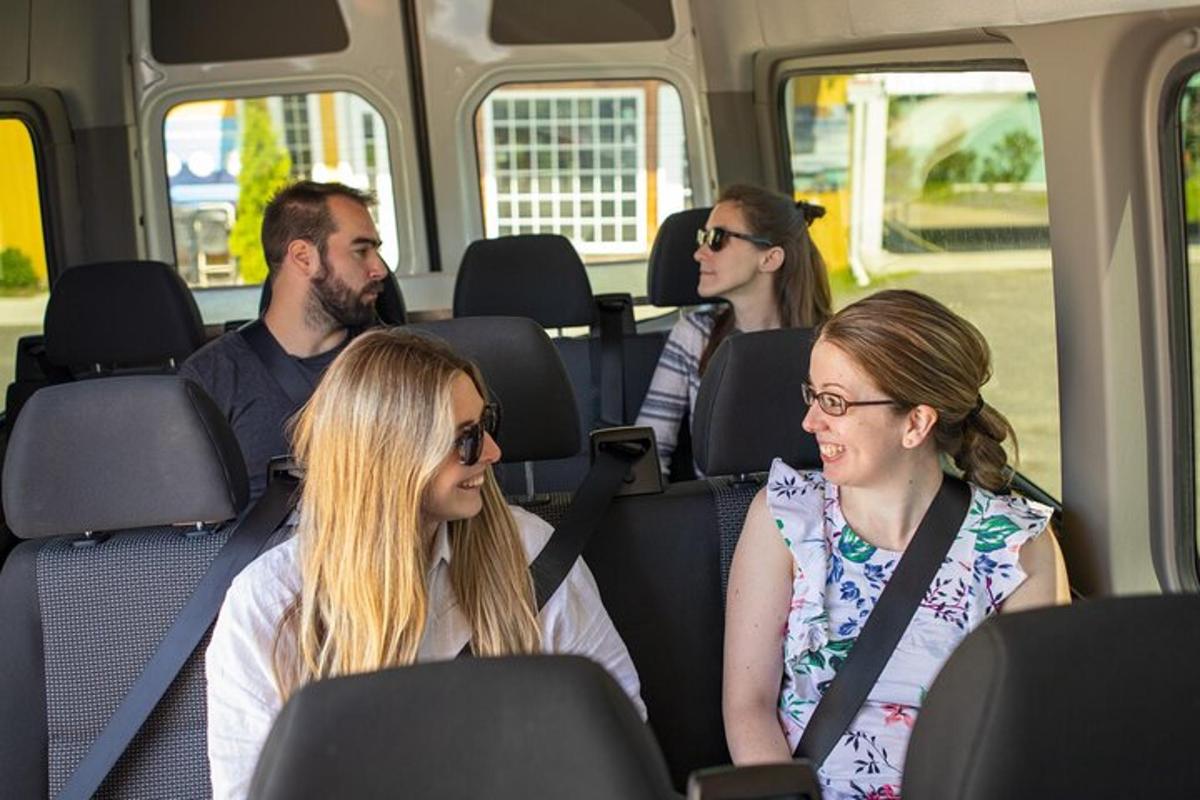 a group of people sitting in a bus