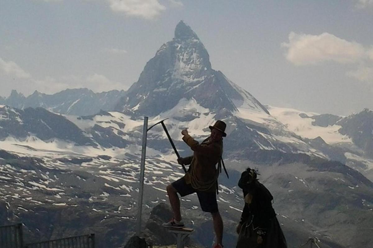 a man standing on top of a mountain