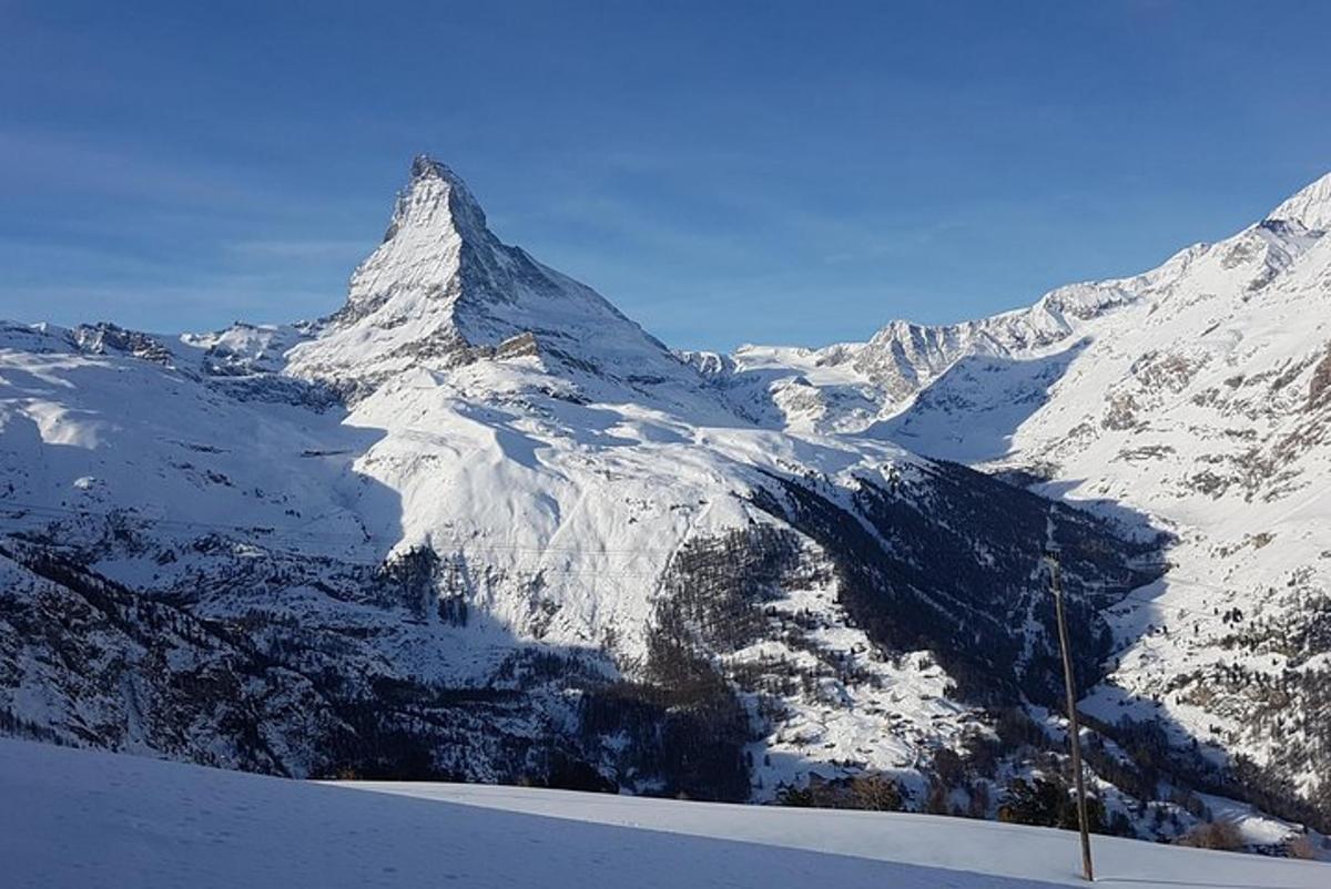 a snow covered mountain with a snow covered mountain