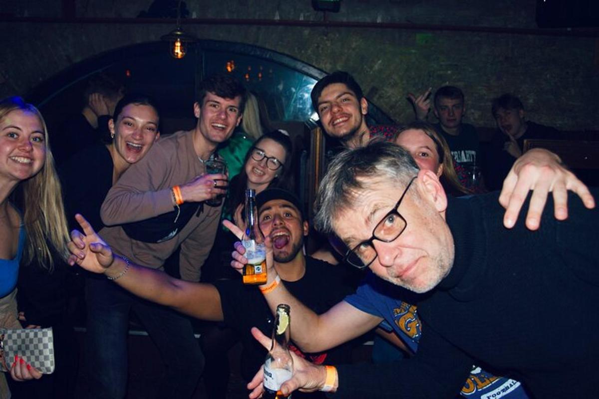 a group of people posing for a picture at a party